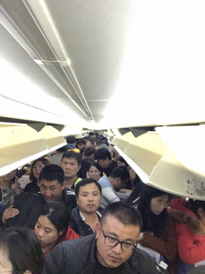 到达天津，都在收拾行李，准备下飞机